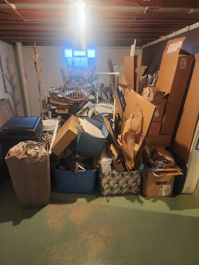 Roll-off dumpster container at job site for 6 Yard Dumpster Rental in Versailles